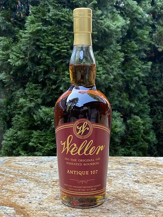 W.L. Weller Antique 107 bourbon bottle outdoors